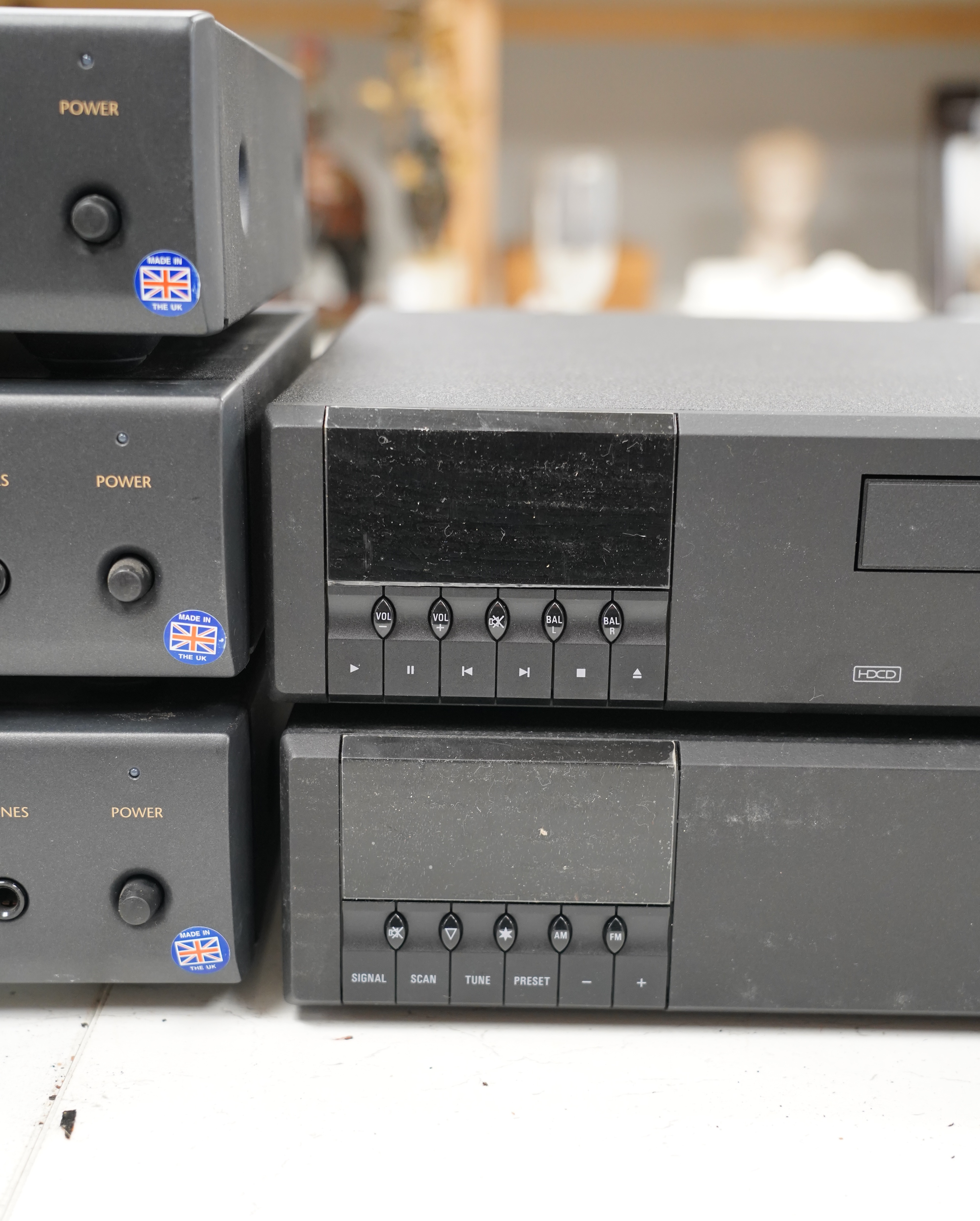 A Linn Pekin tuner, a Linn Genki CD player and three Arcam Alpha 8 Power Amps, with three remote controls, two power cables and instructions for the amplifiers